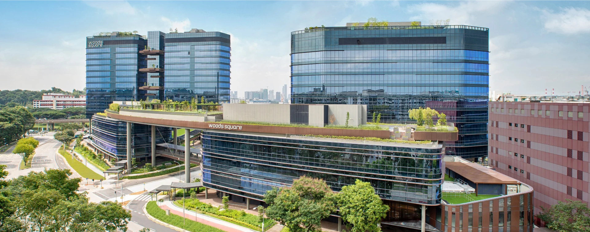 Woods Square twin towers and SOLO buildings aerial view, Woodlands Regional Centre Singapore